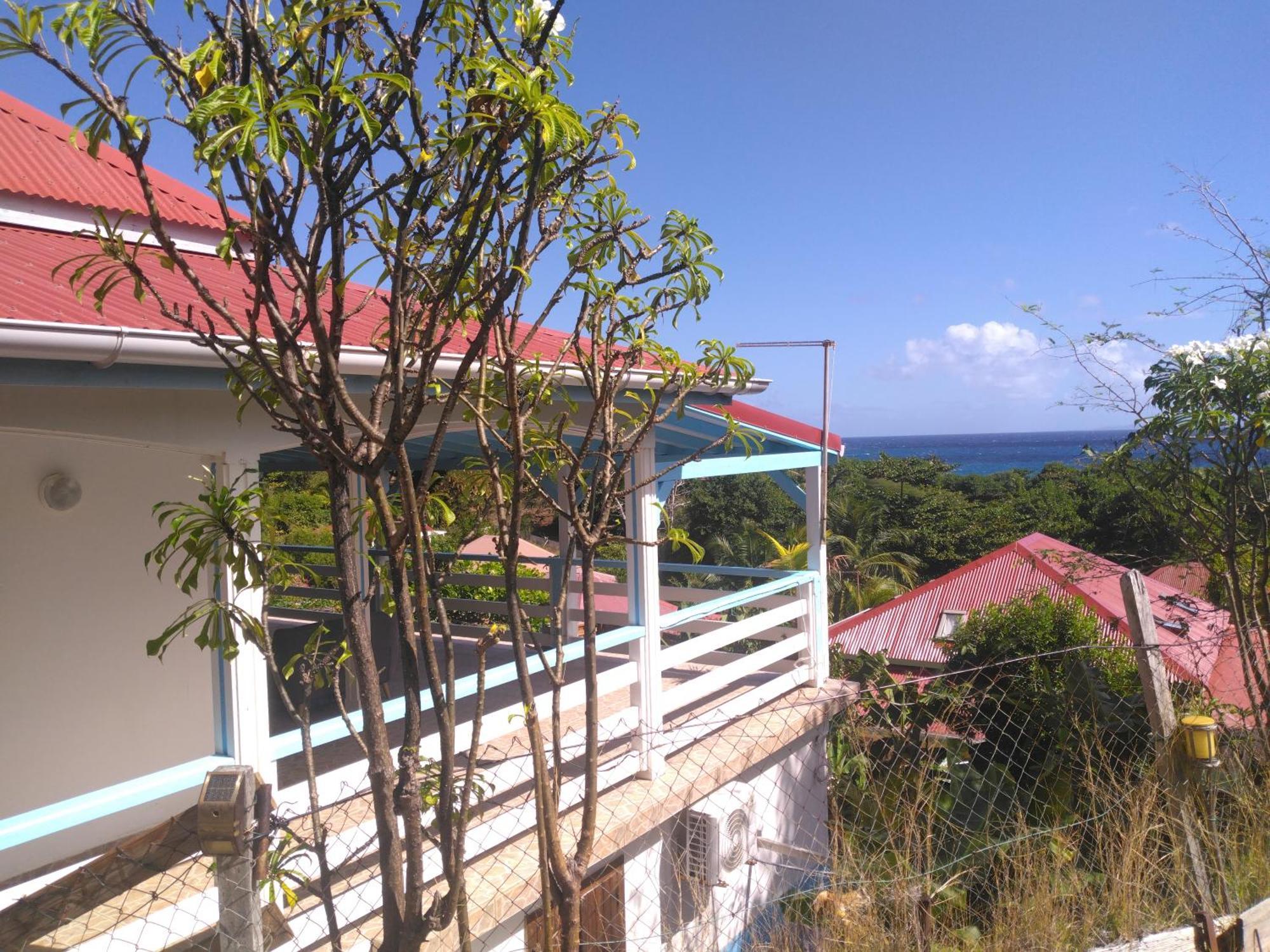 Appartement Maison chaleureuse avec vue sur mer à Terre-De-Haut Chambre photo